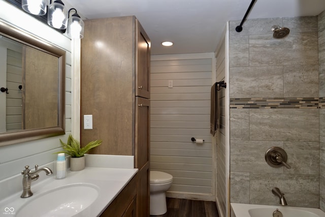 7150 Combs Rd, Indianapolis, IN 46237 - bathroom featuring vanity,  shower combination, and wood finished floors