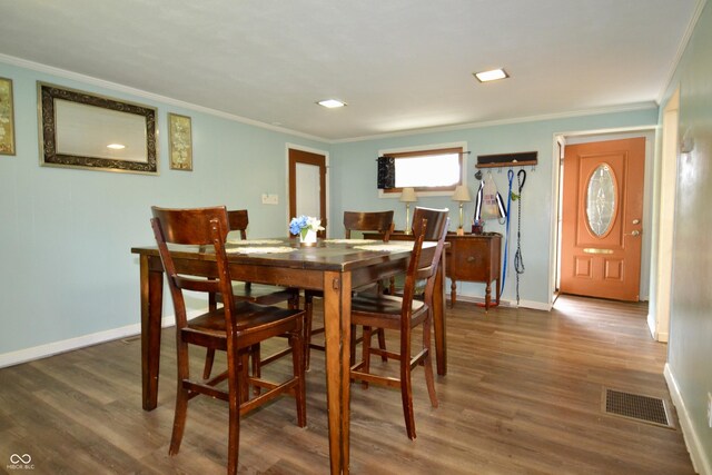 7150 Combs Rd, Indianapolis, IN 46237 - dining space featuring ornamental molding and wood finished floors