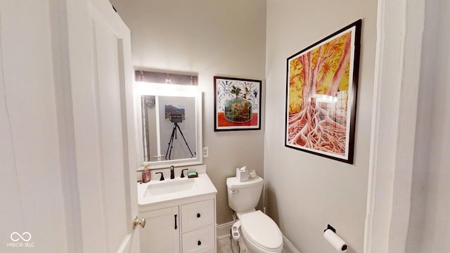 1002 N New Jersey St, Indianapolis, IN 46202 - half bath featuring vanity and toilet