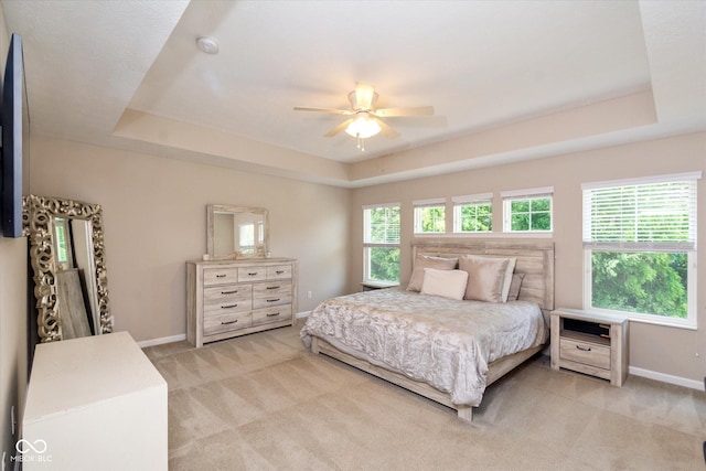 4642 Boyd Pl, Westfield, IN 46062 - bedroom featuring a raised ceiling, light colored carpet, and ceiling fan