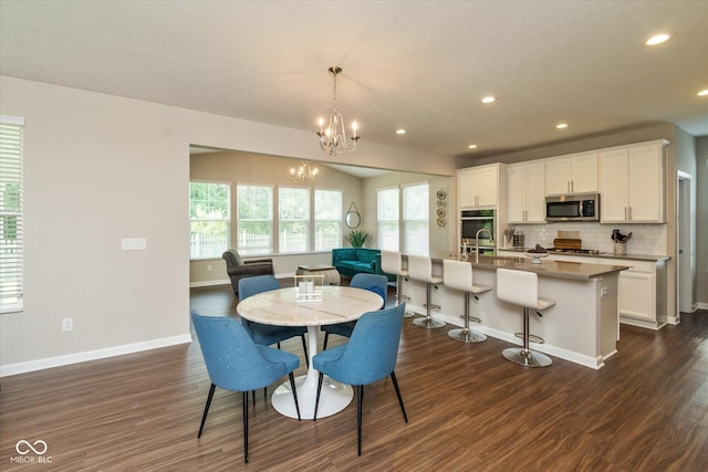 4642 Boyd Pl, Westfield, IN 46062 - dining room with dark wood-type flooring, a chandelier, and recessed lighting