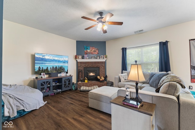 6563 Enclave Blvd, Greenwood, IN 46143 - living area featuring wood finished floors, ceiling fan, and a fireplace