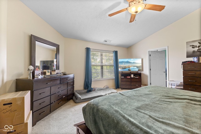6563 Enclave Blvd, Greenwood, IN 46143 - bedroom featuring lofted ceiling, light colored carpet, ceiling fan, and a textured ceiling