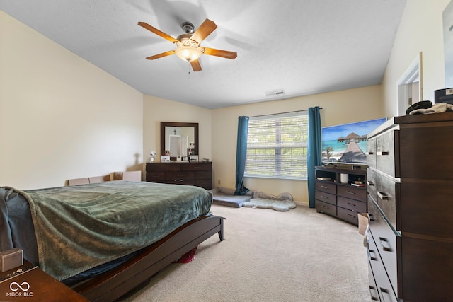 6563 Enclave Blvd, Greenwood, IN 46143 - bedroom featuring lofted ceiling, light colored carpet, and a ceiling fan