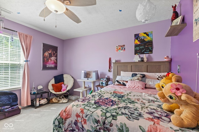 6563 Enclave Blvd, Greenwood, IN 46143 - bedroom with carpet, a textured ceiling, and ceiling fan