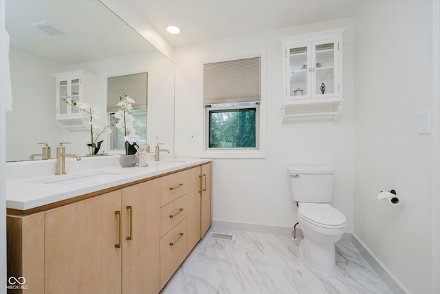1065 E 76th St, Indianapolis, IN 46240 - full bath with double vanity and marble look tile flooring