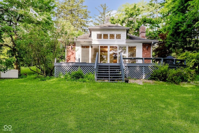 1065 E 76th St, Indianapolis, IN 46240 - back of house with a deck, a chimney, a yard, a sunroom, and stairway