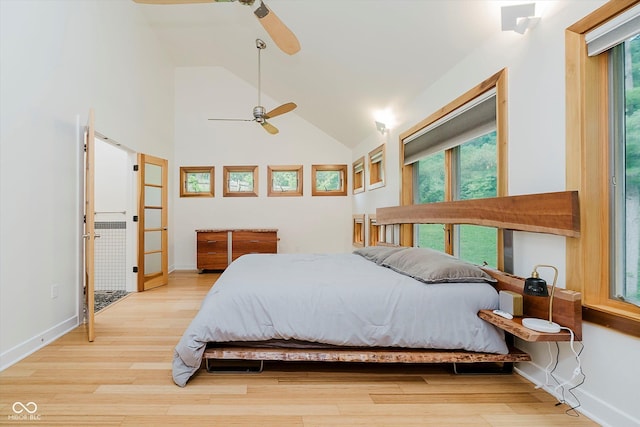 1065 E 76th St, Indianapolis, IN 46240 - bedroom with wood finished floors, high vaulted ceiling, and a ceiling fan