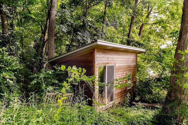 1065 E 76th St, Indianapolis, IN 46240 - view of shed featuring a wooded view