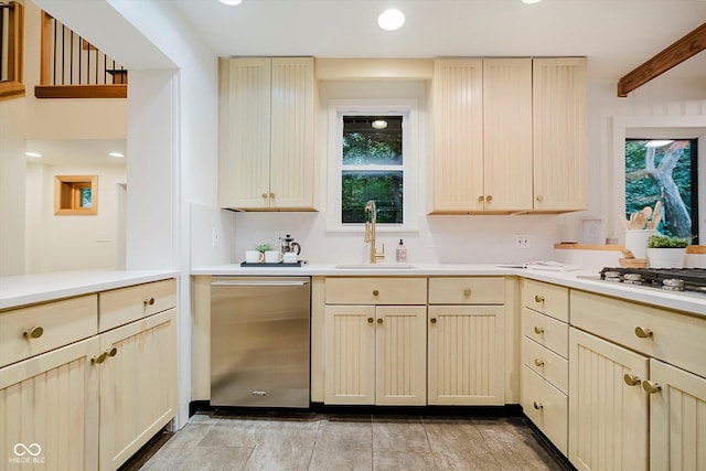 1065 E 76th St, Indianapolis, IN 46240 - kitchen with appliances with stainless steel finishes, light countertops, recessed lighting, and cream cabinets