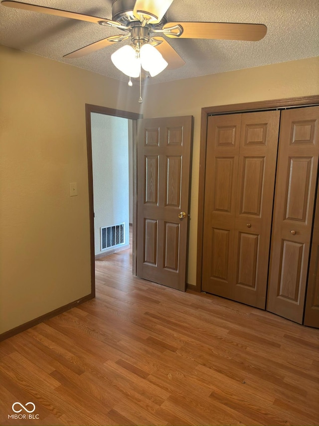 39 Meadow Creek E Boulevard, Whiteland, IN 46184 - unfurnished room featuring a ceiling fan, light wood-type flooring, and a textured ceiling