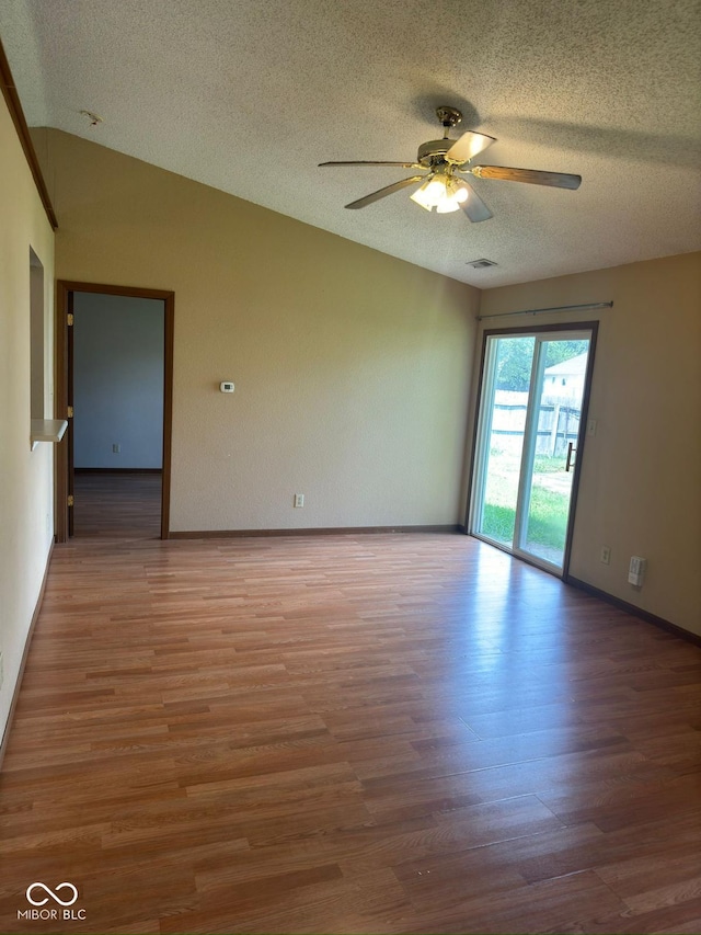 39 Meadow Creek E Boulevard, Whiteland, IN 46184 - unfurnished room with wood finished floors, a ceiling fan, a textured ceiling, and vaulted ceiling