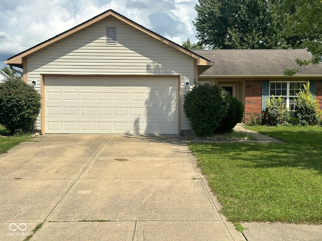 39 Meadow Creek E Boulevard, Whiteland, IN 46184 - ranch-style house with driveway, an attached garage, brick siding, and a front yard