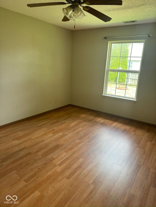 39 Meadow Creek E Boulevard, Whiteland, IN 46184 - unfurnished room featuring light wood-type flooring and a ceiling fan