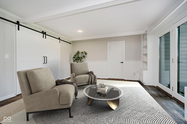 16714 Oak Rd, Westfield, IN 46074 - living area featuring a barn door, dark wood-style floors, crown molding, recessed lighting, and a decorative wall