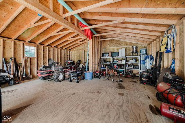16714 Oak Rd, Westfield, IN 46074 - miscellaneous room featuring a garage and lofted ceiling