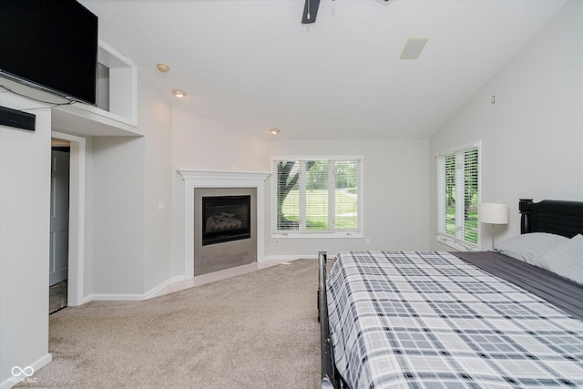 16714 Oak Rd, Westfield, IN 46074 - bedroom with lofted ceiling, carpet floors, a tile fireplace, recessed lighting, and ceiling fan