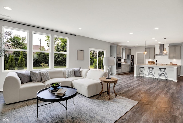 2074 Tompkins Dr, Westfield, IN 46074 - living room featuring dark wood-style flooring and recessed lighting