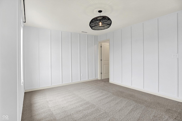 2074 Tompkins Dr, Westfield, IN 46074 - unfurnished bedroom with carpet floors and a decorative wall