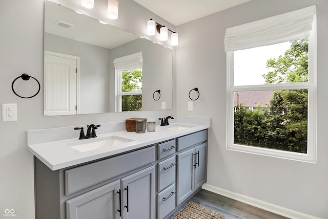 2074 Tompkins Dr, Westfield, IN 46074 - bathroom featuring double vanity and baseboards