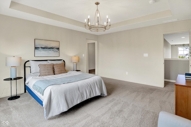 2074 Tompkins Dr, Westfield, IN 46074 - carpeted bedroom with a chandelier and a raised ceiling