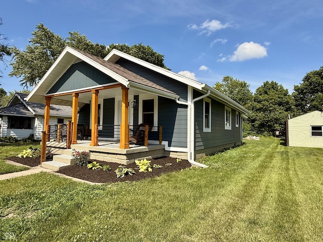 1818 Broadway St, Anderson, IN 46012 - view of front of house featuring a porch and a front yard