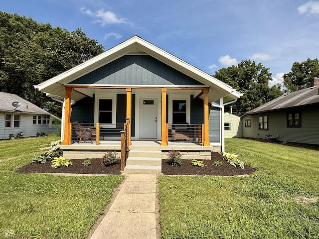 1818 Broadway St, Anderson, IN 46012 - bungalow-style home with a front yard and a porch