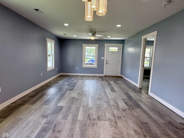 1818 Broadway St, Anderson, IN 46012 - foyer featuring dark wood-style flooring, recessed lighting, ceiling fan, and a chandelier