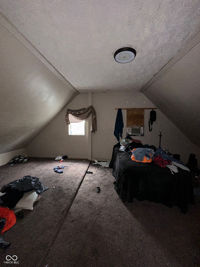 1129 N Pershing Ave, Indianapolis, IN 46222 - additional living space featuring a textured ceiling, vaulted ceiling, cooling unit, and carpet floors