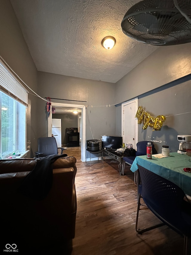1129 N Pershing Ave, Indianapolis, IN 46222 - living room featuring wood finished floors and a textured ceiling