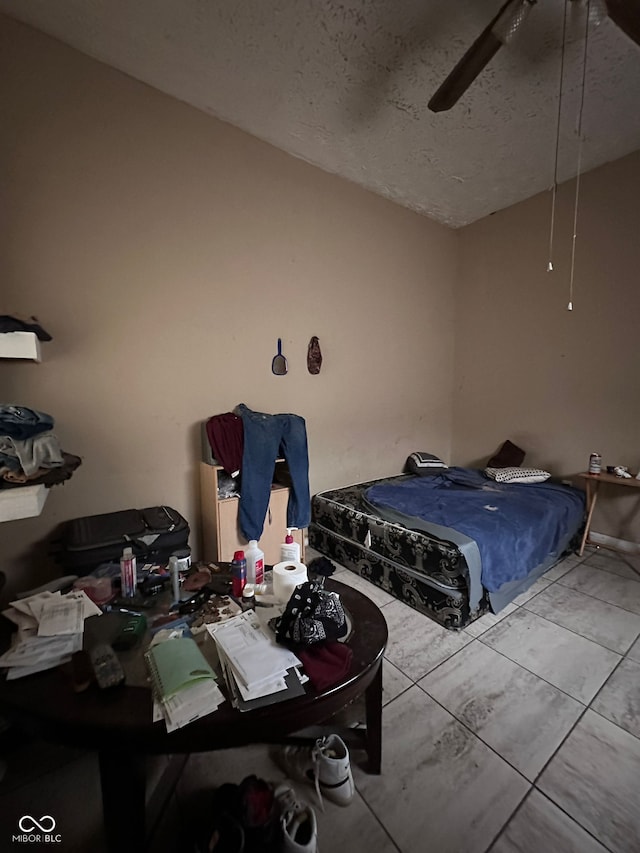 1129 N Pershing Ave, Indianapolis, IN 46222 - bedroom with ceiling fan and a textured ceiling