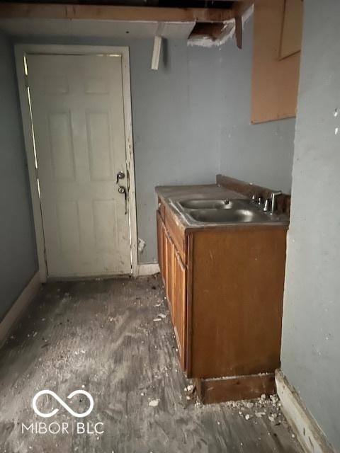 3701 E Vermont St, Indianapolis, IN 46201 - kitchen with a sink and brown cabinets