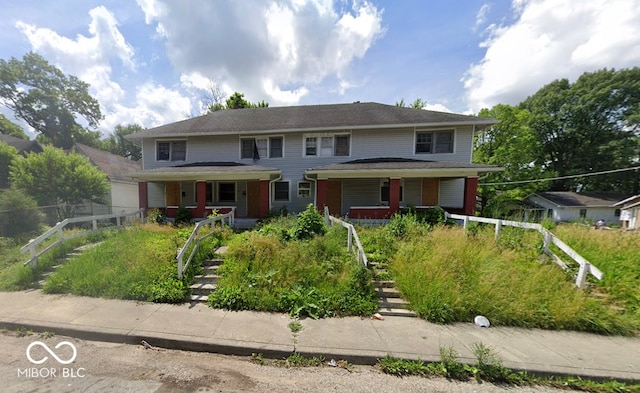 3701 E Vermont St, Indianapolis, IN 46201 - view of front of home featuring a porch and stairway