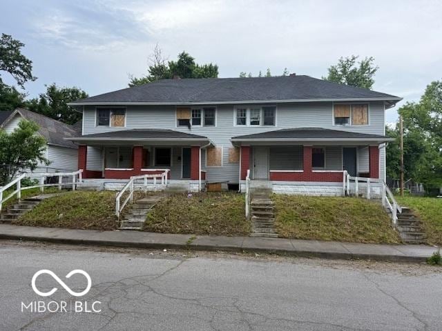 3701 E Vermont St, Indianapolis, IN 46201 - view of front facade featuring a porch and stairs