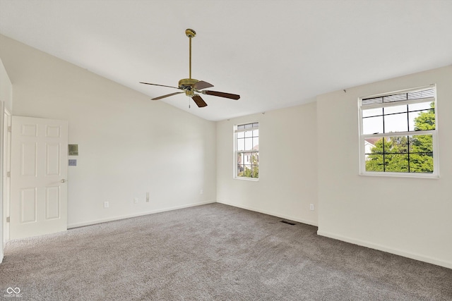 11961 Driftstone Dr, Fishers, IN 46037 - carpeted empty room featuring vaulted ceiling and ceiling fan