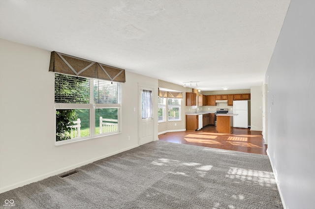 11961 Driftstone Dr, Fishers, IN 46037 - unfurnished living room with carpet and baseboards