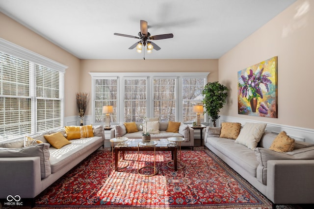 1130 Kingswood Rd S, West Lafayette, IN 47906 - living room featuring a ceiling fan, healthy amount of natural light, and wainscoting
