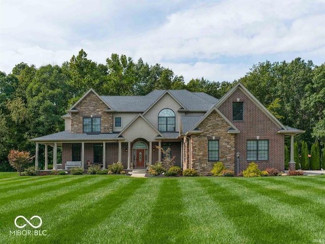 1130 Kingswood Rd S, West Lafayette, IN 47906 - view of front of property featuring a front lawn, stucco siding, and stone siding