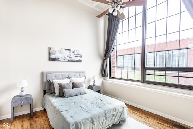 624 E Walnut St Unit 48, Indianapolis, IN 46204 - bedroom with wood-type flooring and a ceiling fan