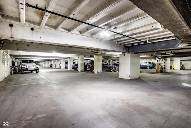 624 E Walnut St Unit 48, Indianapolis, IN 46204 - parking deck featuring a garage door opener