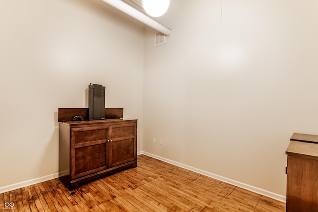624 E Walnut St Unit 48, Indianapolis, IN 46204 - detailed view of wood finished floors and baseboards