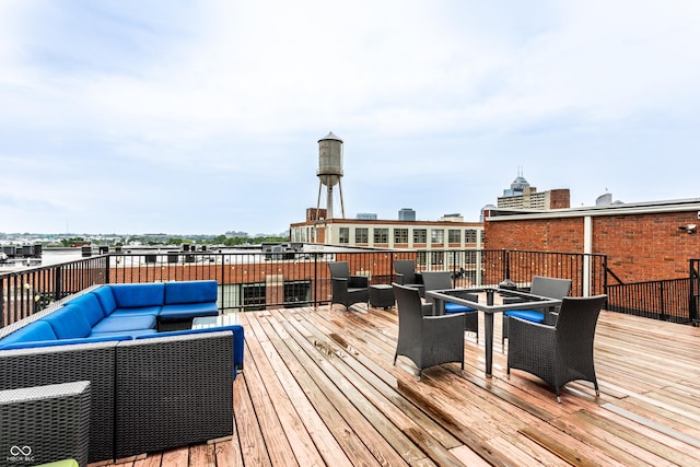 624 E Walnut St Unit 48, Indianapolis, IN 46204 - wooden terrace featuring outdoor lounge area and outdoor dining space