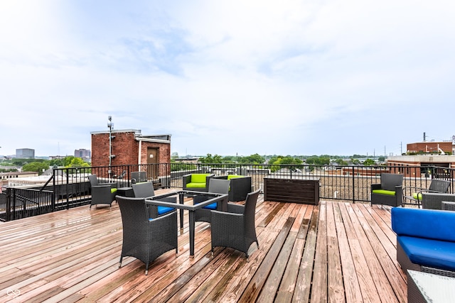 624 E Walnut St Unit 48, Indianapolis, IN 46204 - wooden terrace with an outdoor living space