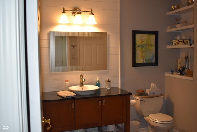 7357 Lake Lakota Dr, Indianapolis, IN 46217 - bathroom with vanity and tasteful backsplash
