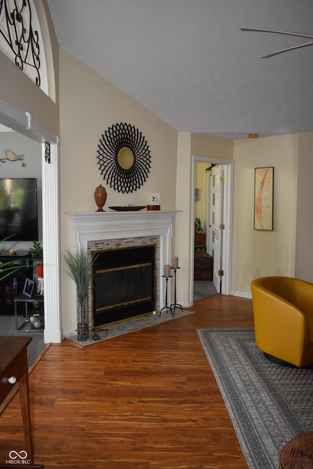 7357 Lake Lakota Dr, Indianapolis, IN 46217 - living room with wood finished floors and a fireplace with flush hearth