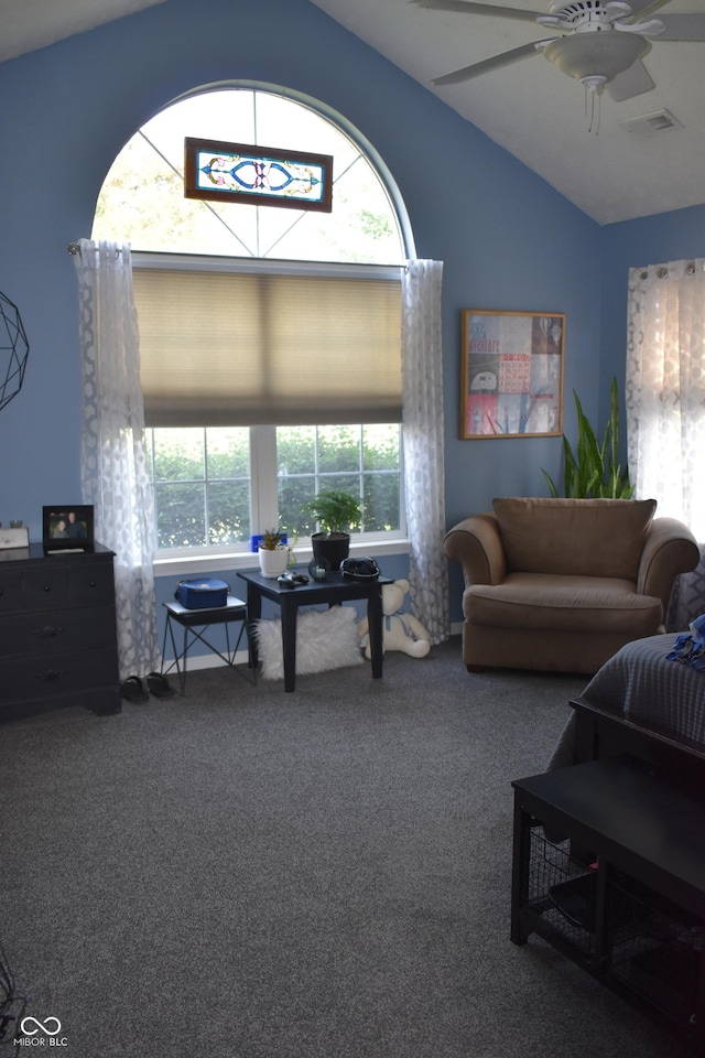 7357 Lake Lakota Dr, Indianapolis, IN 46217 - living area with vaulted ceiling, carpet flooring, and a ceiling fan