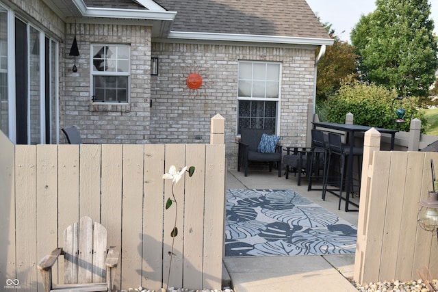 7357 Lake Lakota Dr, Indianapolis, IN 46217 - wooden deck featuring a patio area