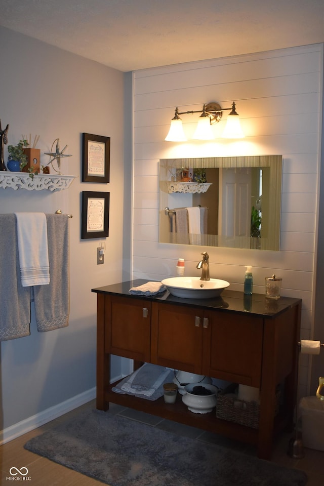 7357 Lake Lakota Dr, Indianapolis, IN 46217 - bathroom with vanity and baseboards