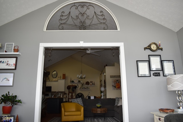 7357 Lake Lakota Dr, Indianapolis, IN 46217 - detailed view of a ceiling fan, a textured ceiling, and a chandelier