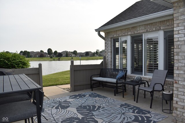 7357 Lake Lakota Dr, Indianapolis, IN 46217 - view of patio / terrace featuring a water view
